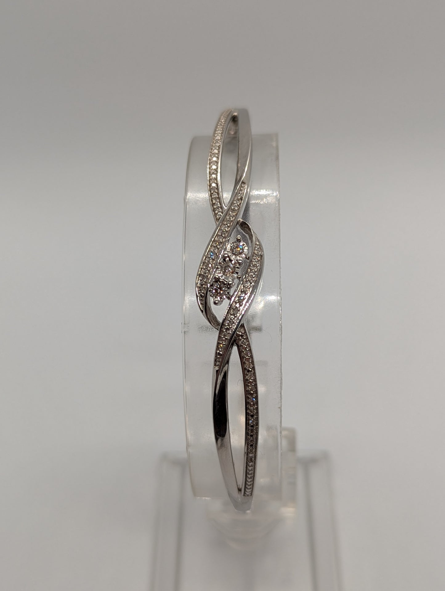 Sterling Silver 1/4CT. Diamond 3-Stone Bypass Hinged Bangle Bracelet