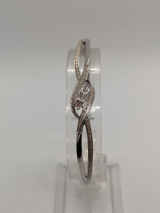 Sterling Silver 1/4CT. Diamond 3-Stone Bypass Hinged Bangle Bracelet