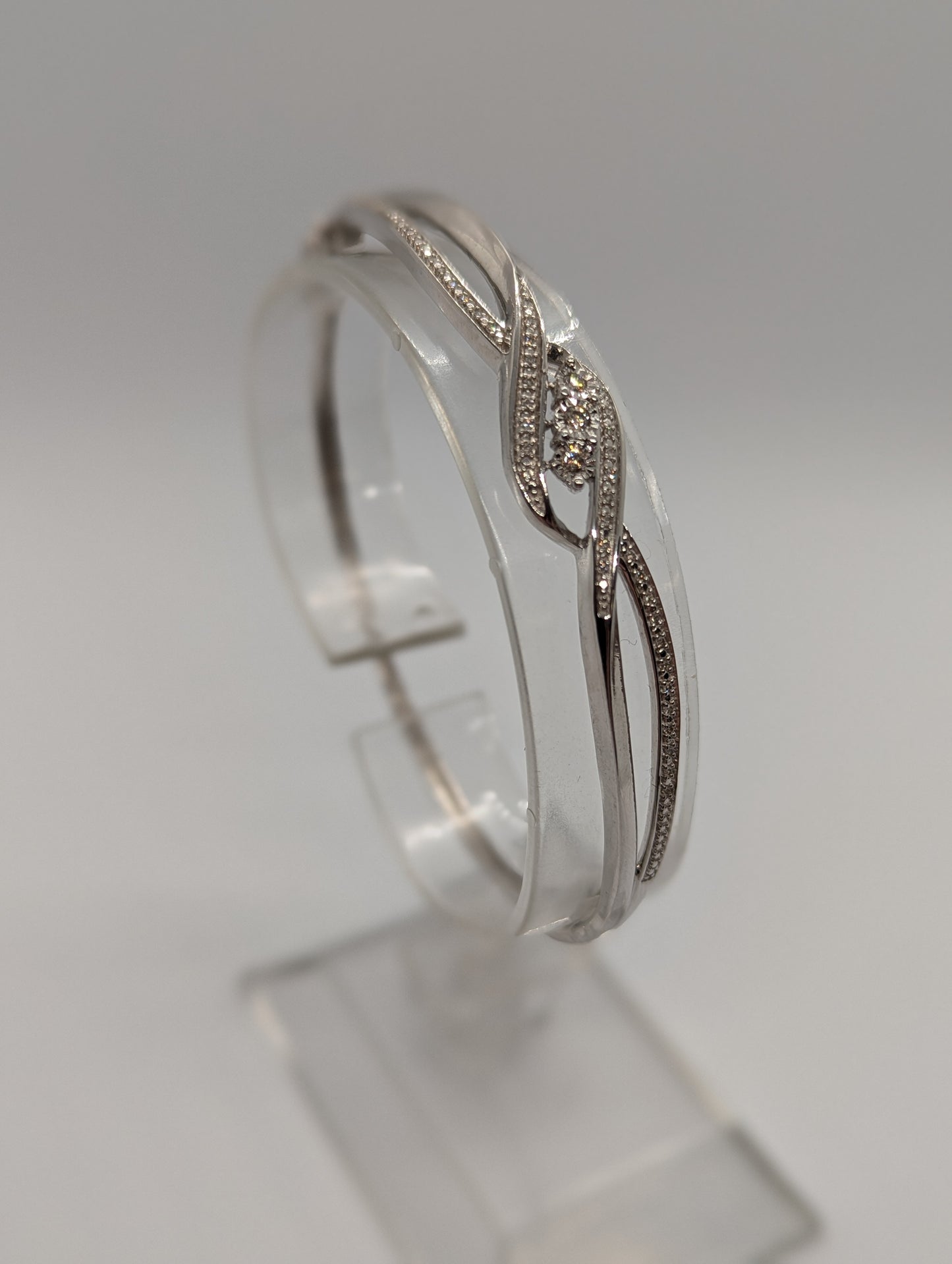 Sterling Silver 1/4CT. Diamond 3-Stone Bypass Hinged Bangle Bracelet
